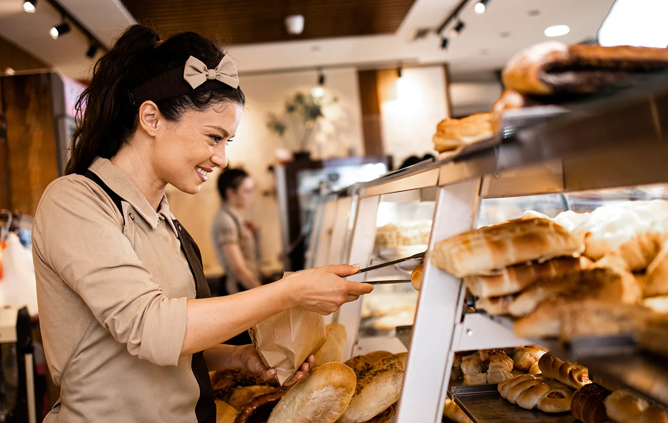 employee supermarket stocking bakery