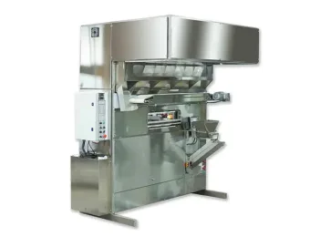Colbake intermediate proofer system for bread and roll production.