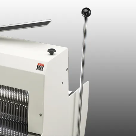 Close-up product image of the JAC Duro semi-automatic bread slicer lever and control-side detail used in professional bakery loaf slicing workflows.