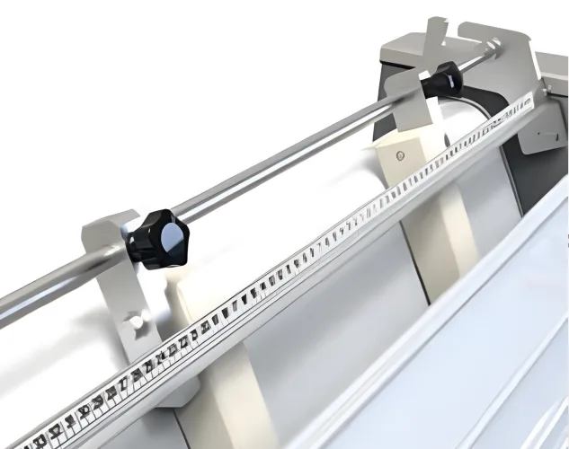 Close-up of the JAC Unic French Bread Moulder outfeed guides used to help control final product length and shape.