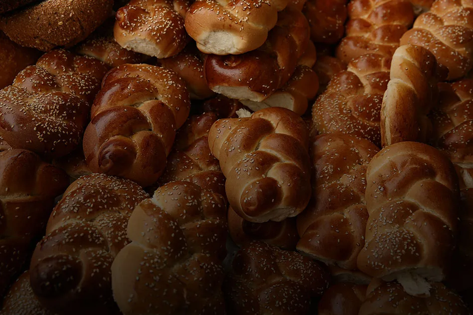 Kosher bakery products such as challah prepared using commercial bakery equipment provided by Erika Baking Equipment.