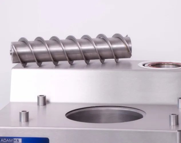 removable auger screw from the Bilait Adam K6 chocolate tempering machine used for chocolate circulation