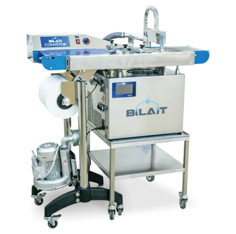 Bilait Adam K6 chocolate tempering machine with optional compact chocolate enrobing conveyor system