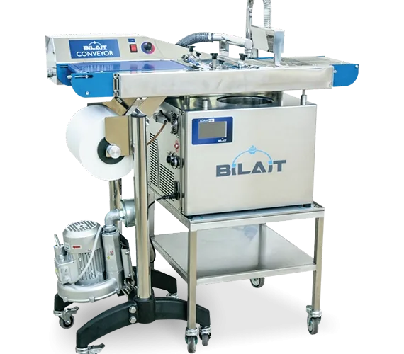 Bilait Adam K6 chocolate tempering machine with optional compact chocolate enrobing conveyor system