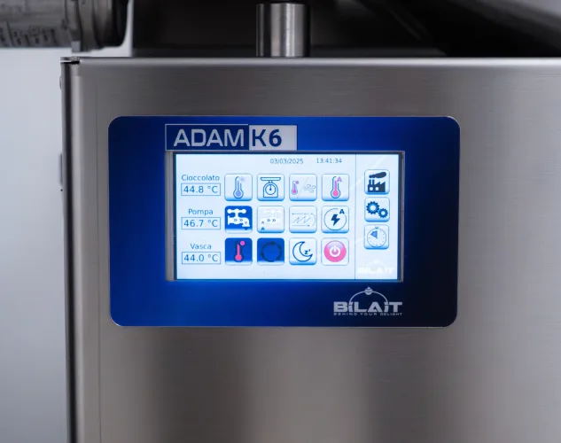 Bilait Adam K6 chocolate tempering machine touchscreen control panel displaying tempering temperatures