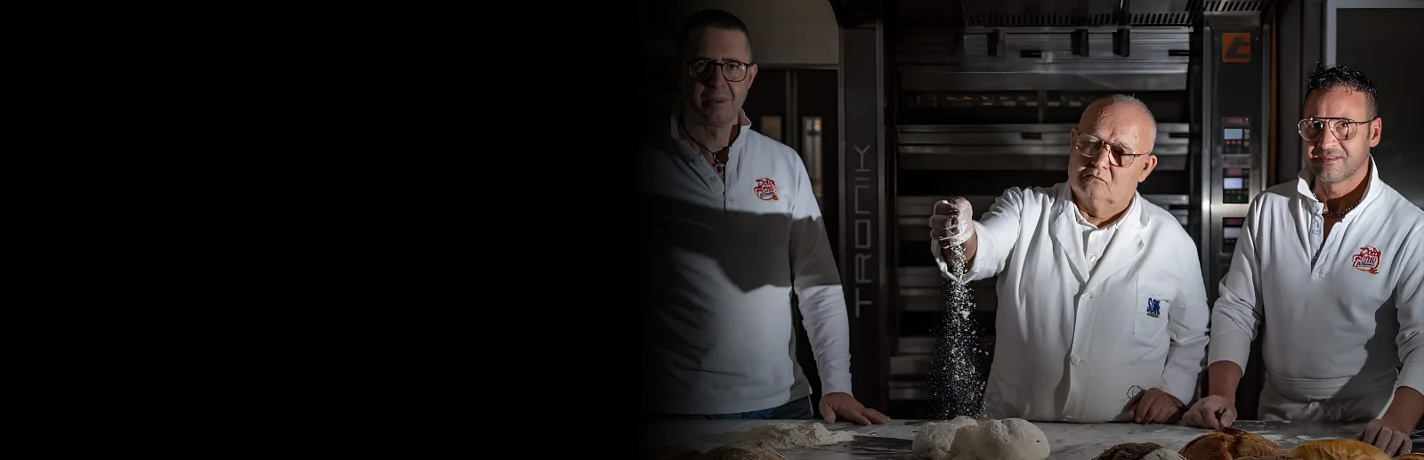 Professional bakers working near commercial bakery ovens, representing Erika Baking Equipment’s trust, integrity, and hands-on bakery equipment expertise.